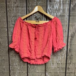 red off the shoulder shirt